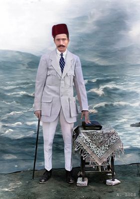Bombay. Merwan wearing a business suit.
