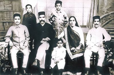 (L–R) Merwan, Beheram (standing), Uncle Khodadad, Jal (standing), Adi Jr., Shireen and Jamshed.