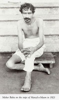 Seated on the steps of Manzil-e-Meem.